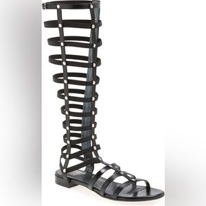 Stuart Weitzman Gladiator Sandals in Black Nappa.
